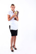 Full length studio shot of a waitress with menu and order pad