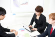 Photo: a businessteam on the meeting a businessteam on the meeting