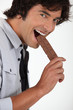 Man eating chocolate
