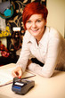 Female sales assistant in clothing store
