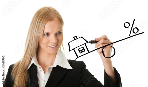 Photo: Businesswoman drawing a mortgage illustration Businesswoman drawing a mortgage illustration