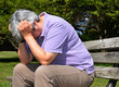 middle-aged woman in despair