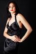model in black silk dress
