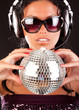Foto: Model is holding a shpere Model is holding a shpere