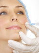 Woman gets cosmetic injection of botox. Beauty Treatment