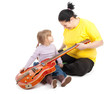 fat mother and daughter with electric guitar