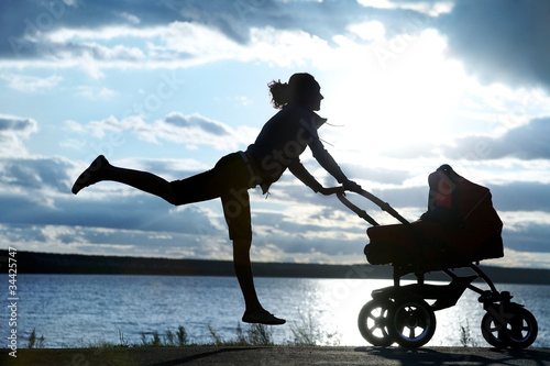 Photo: Mother with a stroller Mother with a stroller