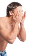 Young man wash face