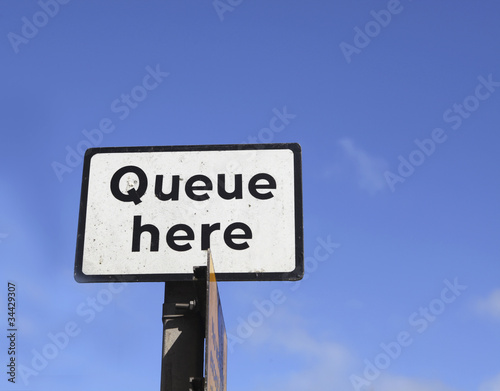 Photo: Queue here Queue here