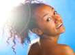 mulatto woman on sky background