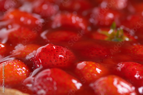 Photo: sweet strawberry pie on a white table sweet strawberry pie on a white table