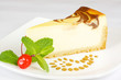 Gourmet slice of cheesecake on the white background