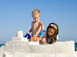 Kids Building Sandcastle on a Beach