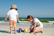 Photo: Children Playing at the Beach Children Playing at the Beach
