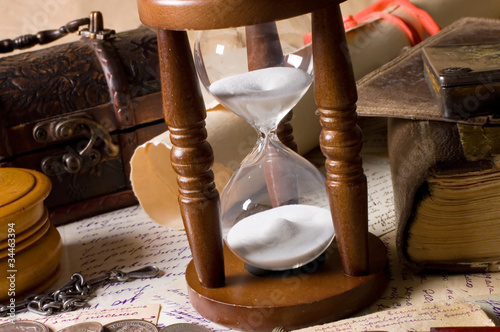 Photo: Hourglass and the book - vintage Hourglass and the book - vintage