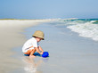 Child playing in the sand
