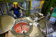 skilled worker at the aluminum melt