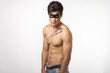 attractive young muscled man in a mask