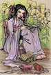 Little asian girl reading book to her doll