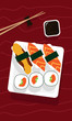 Susi and rolls on a plate. Chopsticks and sauce.