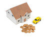 Toy car and house with coins Toy car and house with coins