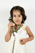 toddler talking over phone