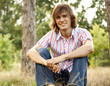 Foto: Smiling handsome man at outdoors Smiling handsome man at outdoors