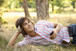 Foto: Smiling handsome man with headphones at outdoors Smiling handsome man with headphones at outdoors