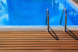 blue swimming pool with teak wood flooring blue swimming pool with teak wood flooring
