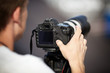 Photographer with Telephoto Lens
