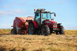tractor collecting haystack in the field tractor collecting haystack in the field