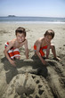 Photo: building a sandcastle building a sandcastle