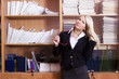 Foto: Young attractive blonde in business clothes on Young attractive blonde in business clothes on