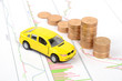Toy car and financial graph Toy car and financial graph