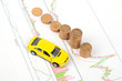 Toy car and financial graph Toy car and financial graph
