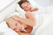 Photo : Angry woman awaken by her boyfriend\'s snoring