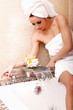 Foto: Woman getting ready for bath Woman getting ready for bath