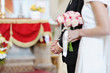 Groom's hands during the wedding ceremony