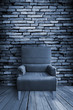 Photo: old single sofa seat in front of the wall old single sofa seat in front of the wall