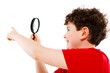Boy looking through magnifying glass isolated on white Boy looking through magnifying glass isolated on white