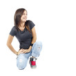 Woman kneeling down looking to her left