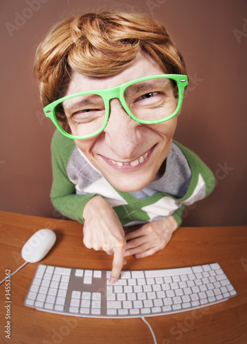 Photo: Funny guy at the computer Funny guy at the computer