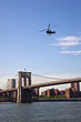 Photo : NYPD helicopter over the Brooklyn Bridge