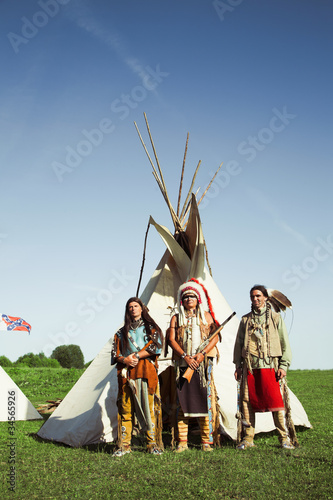 Photo: Group of North American Indians about a wigwam Group of North American Indians about a wigwam