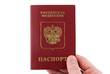 The russian Passport hold in hand.