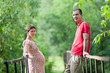 Husband with his pregnant wife on the bridge Husband with his pregnant wife on the bridge