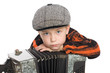 Boy wearing a cap with accordion.