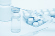 Medical still-life with syringes and tablets (blue toed)