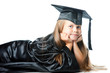 Cute little girl in graduation dress on isolated white
