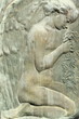 relief of kneeling angel as decoration on tomb relief of kneeling angel as decoration on tomb